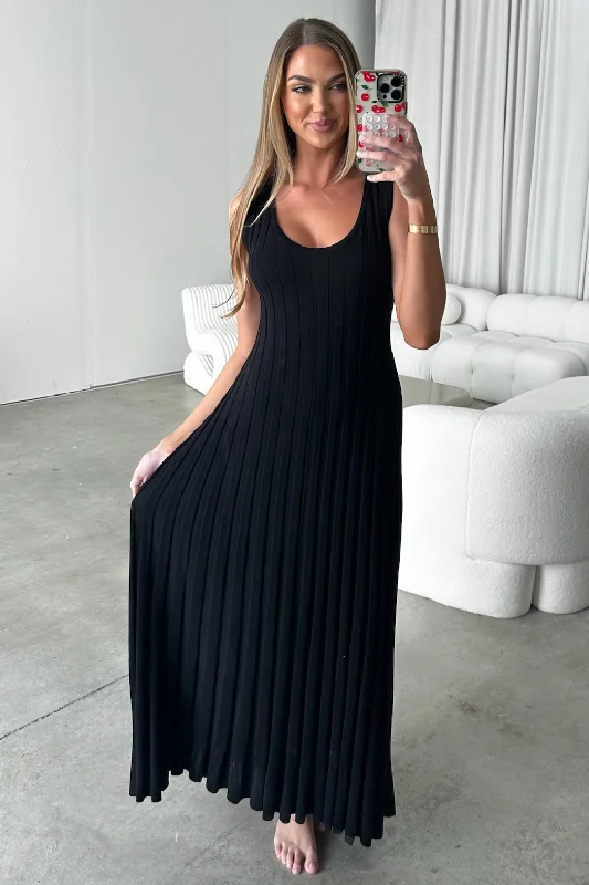 Midi dresses with fringe details for a fun and energetic style Bailey Ribbed Knit Maxi Dress in Black Midi dresses with fringe details for a fun and energetic style Bailey Ribbed Knit Maxi Dress in Black