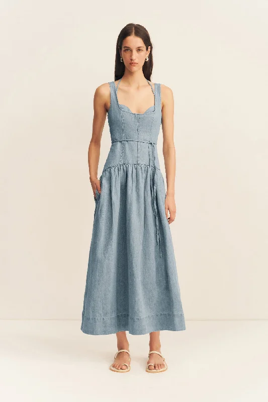 Midi dresses with ruffled bodices for a more pronounced feminine look ELLSWORTH BUSTIER GATHERED MIDI DRESS - BLEACHED BLUE Midi dresses with ruffled bodices for a more pronounced feminine look ELLSWORTH BUSTIER GATHERED MIDI DRESS - BLEACHED BLUE