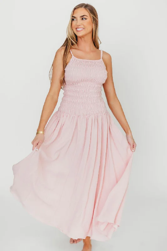 A - line midi dresses with floral prints for spring brunches Kira Smocked Maxi Dress in Pink