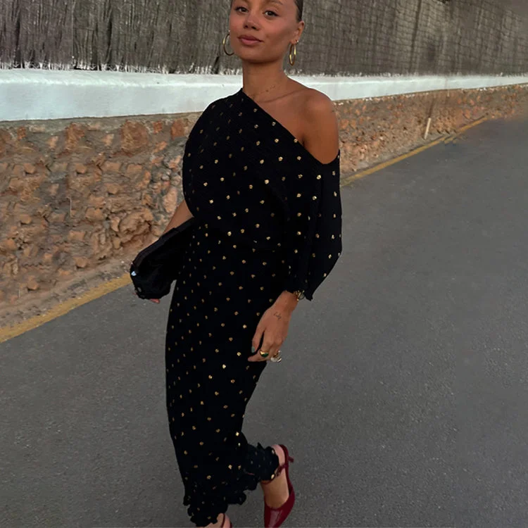 Midi dresses with fringe details for a fun and energetic style Black Tilly Plisse Dress with Gold Fleck