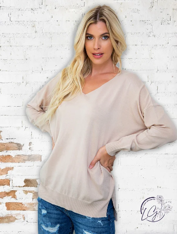 Women's Cropped Cable - Knit Merino Wool Sweater in Beige for a Trendy Fall OutfitCurvy Daydreamer V-Neck Sweater in Nude Women's Cropped Cable - Knit Merino Wool Sweater in Beige for a Trendy Fall OutfitCurvy Daydreamer V-Neck Sweater in Nude