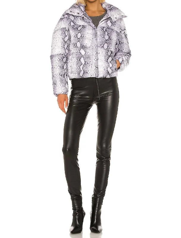 Women's waterproof parka coats with multiple pockets for practicalityJamie Snake Print Puffer Coat In Lilac